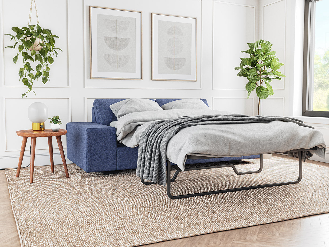 G: Shown in Walnut wood with the Blumen Sofa Bed in Melton Marine fabric