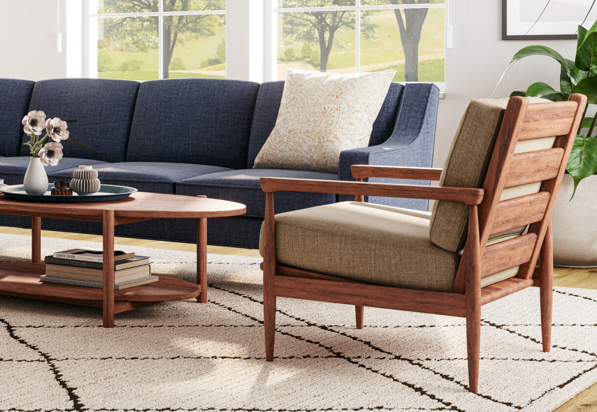 IRL: Zavis Corner Sectional in Smart Denim fabric, Lulu and Judge throw pillows, Iris Coffee Table in walnut wood, Mosh Ottoman, Palder Side Table, and EIM Chair