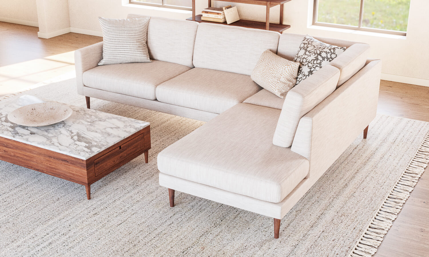 IRL: Lala Bumper 90"x110" Sectional in New Delhi Bleach fabric and Walnut Thom Leg, shown with Sino Coffee Table