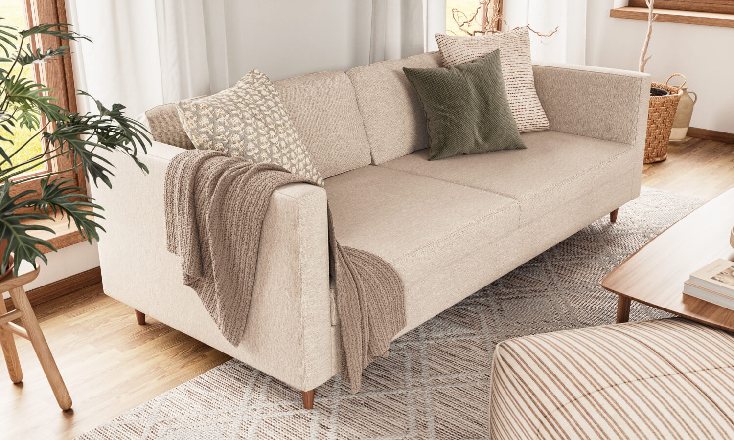 IRL: Mota 84" Sofa shown in Texture Dove fabric and Thom Cafe legs