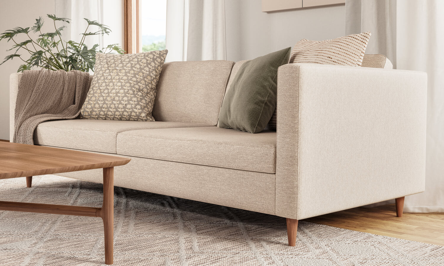 IRL: Mota 84" Sofa shown in Texture Dove fabric and Thom Cafe legs