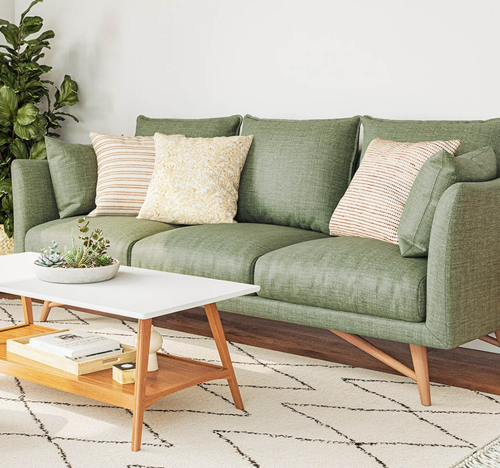 IRL: Gio Sofa in Smart Thyme fabric + Lulu Pillows in Resha, Bahara, and Kasuri + Iris Shelf in walnut + Mayer Pouf in Deluxe Amber fabric + Koper Side Table