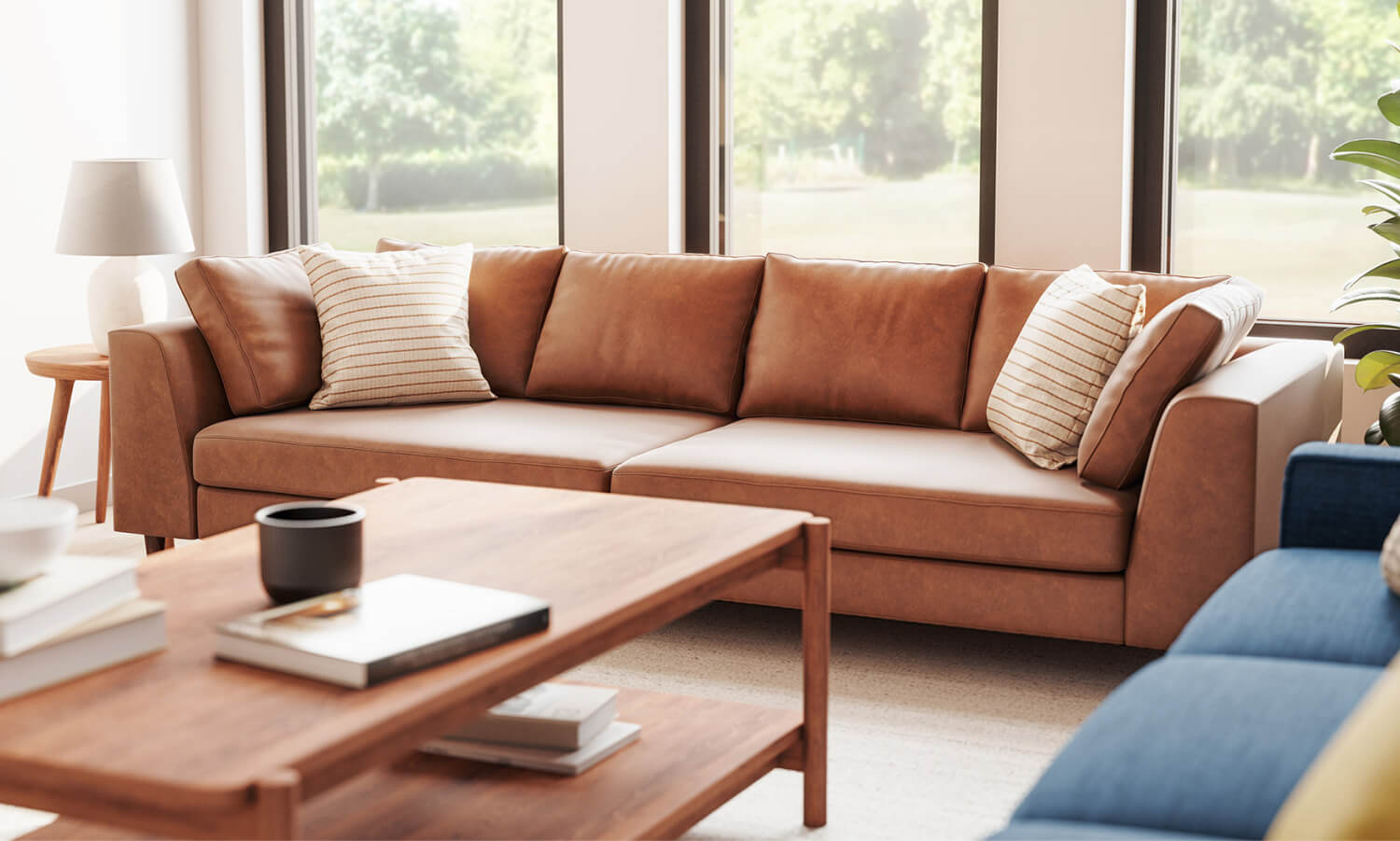 Shown in Milo Spice Leather with Iris Rectangular Coffee Table in Walnut