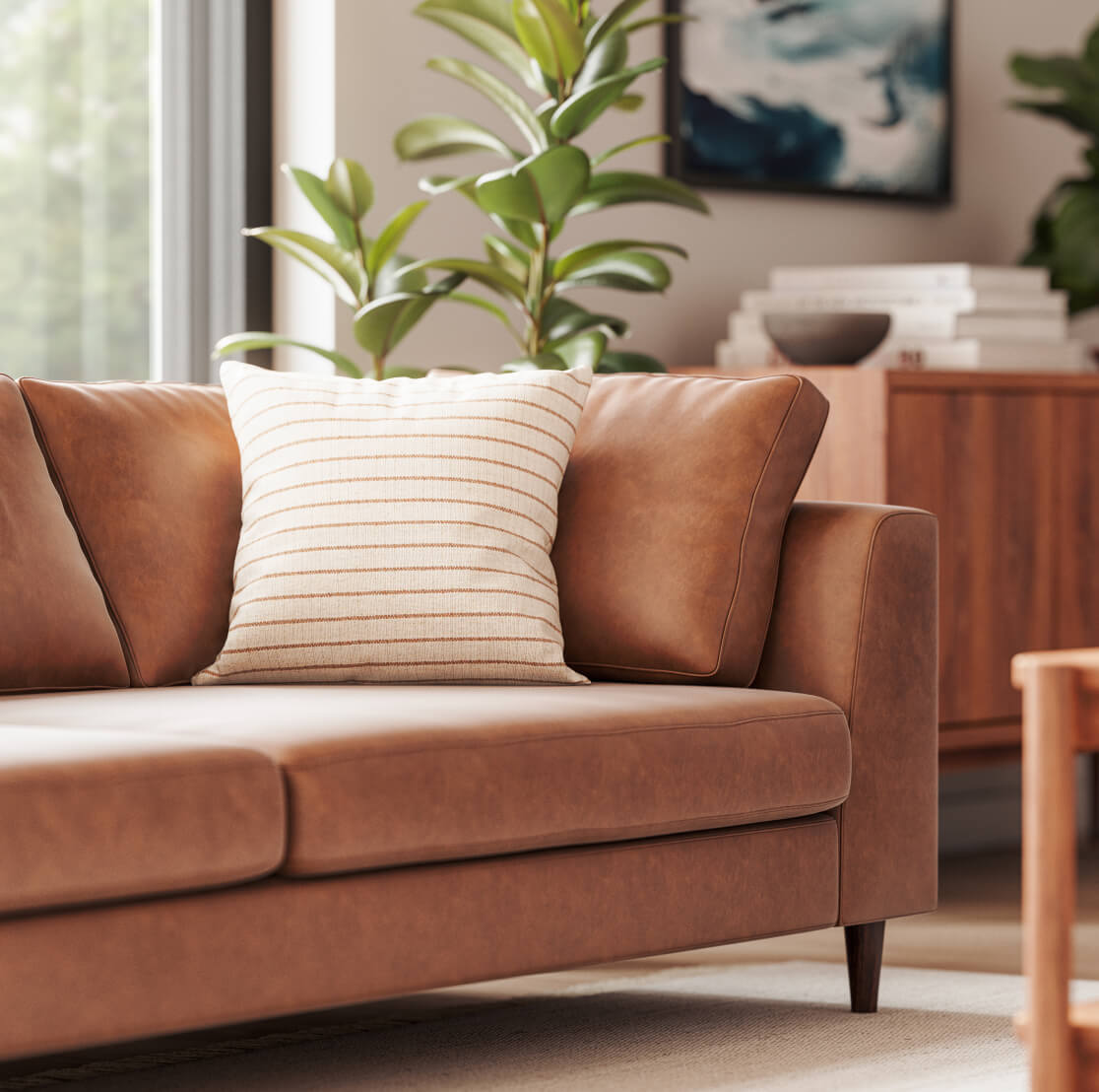 Shown in Milo Spice Leather with Iris Rectangular Coffee Table in Walnut