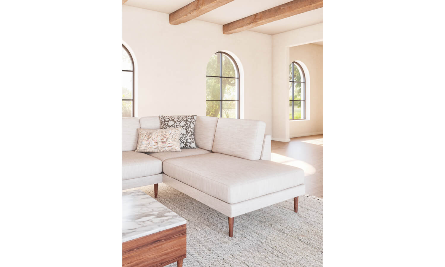 IRL: Lala Bumper 90"x110" Sectional in New Delhi Bleach fabric and Walnut Thom Leg, shown with Sino Coffee Table