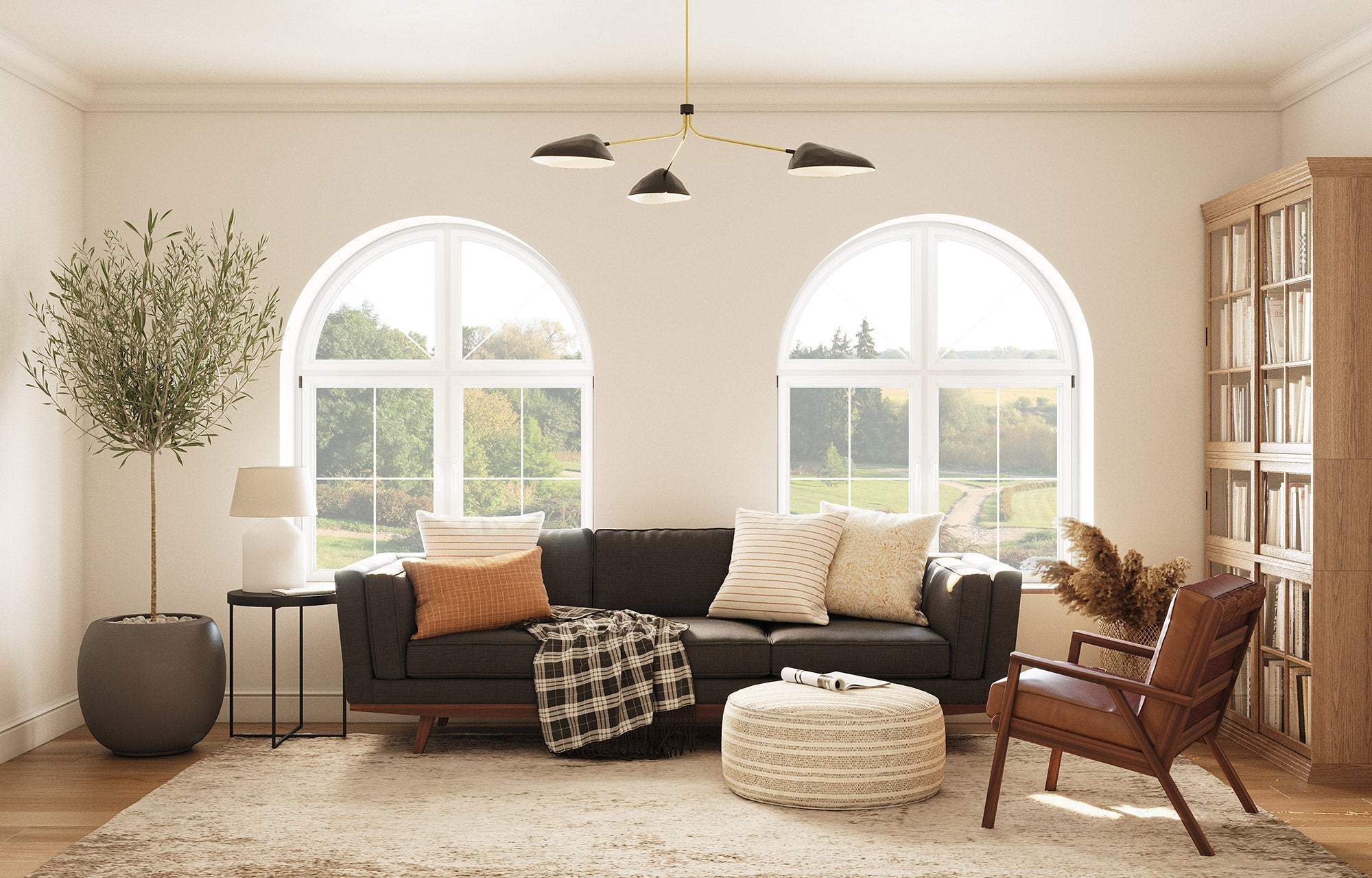 G: Shown in Texture Oyster Fabric with Lulu PIllows in Sirsi and Bahara, Ridge Chair in Fargo Leather, and Norah Pouf Dhani Fabric
