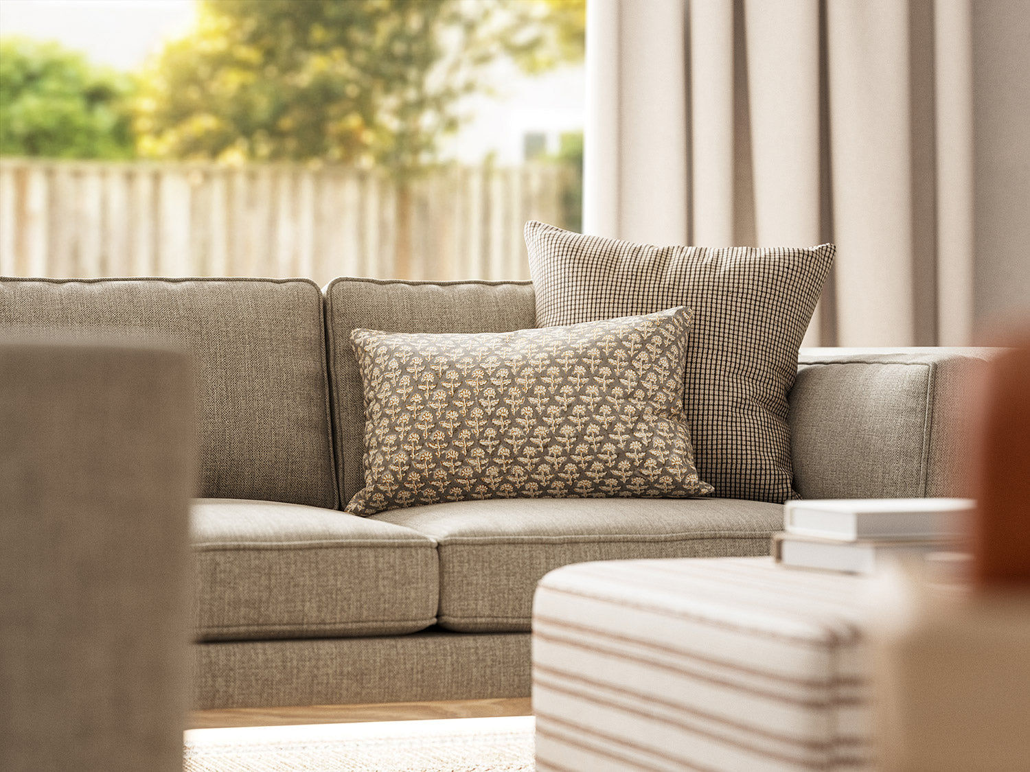 Shown in Phulara fabric with the Lulu Throw Pillow in Kala fabric on the Kirnik Corner Sectional in Smart Smoke fabric