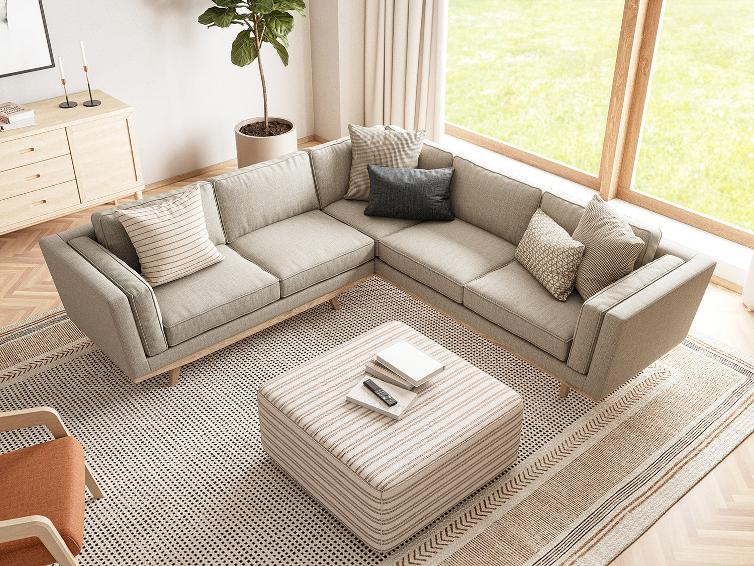 IRL: Kirnik Corner Sectional in Smart Smoke fabric, Harrison Credenza, Burr Chair in maple wood with Deluxe Wood fabric, Harlan Ottoman in Kasuri fabric, Lulu and Judge Throw Pillows